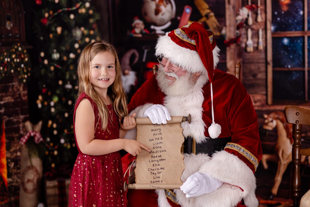 girl smiling with santa 